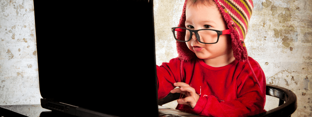 Copywriting for a class listing: image shows baby looking at a computer as if doing very important work,